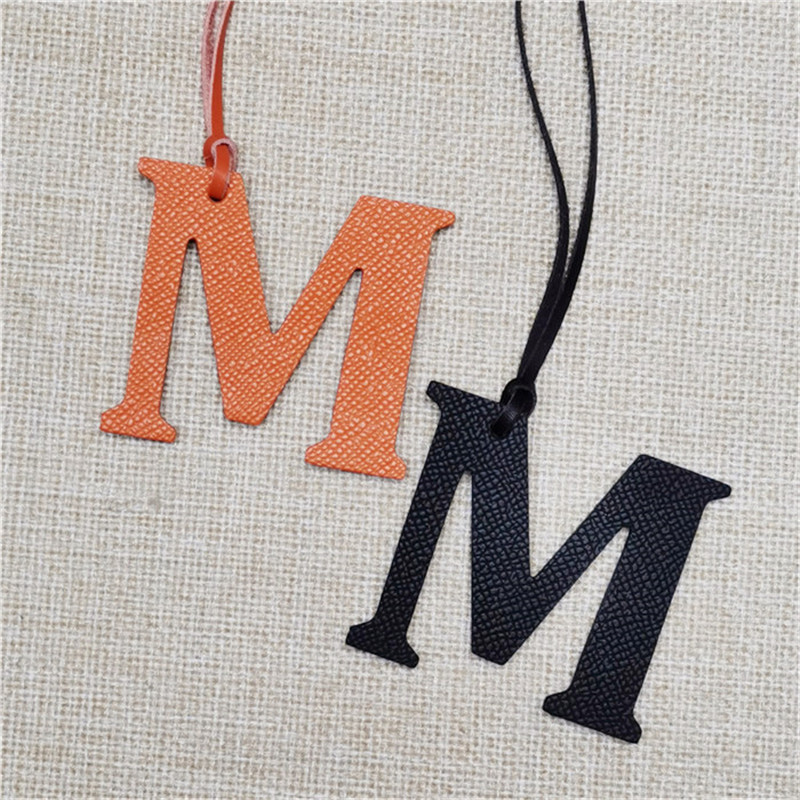 XMESSUN Nuovo Ciondolo con Let - Monogram Keychain Leather recensione e prezzo