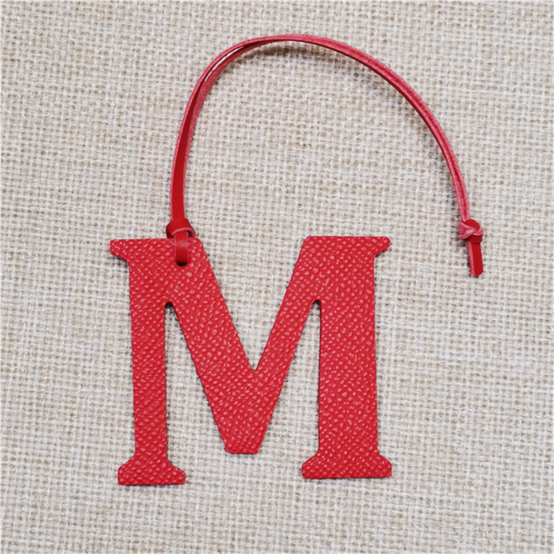 XMESSUN Nuovo Ciondolo con Let - Monogram Keychain Leather recensione e prezzo